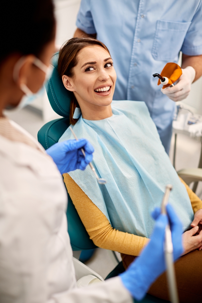 woman in dental chair receiving treatment